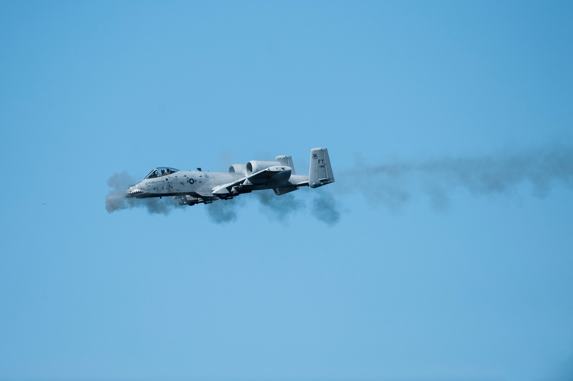 An A-10C Thunderbolt II from the 23d Fighter Group fires at a target during a training exercise, Feb. 23, 2016, at Moody Air Force Base, Ga. Multiple U.S. Air Force aircraft within Air Combat Command conducted joint aerial training at Grand Bay Bombing and Gunnery Range. During the training, the aircraft conducted tactical air and ground maneuvers, as well as weapons training. (U.S. Air Force photo by Airman 1st Class Lauren M. Johnson/Released)