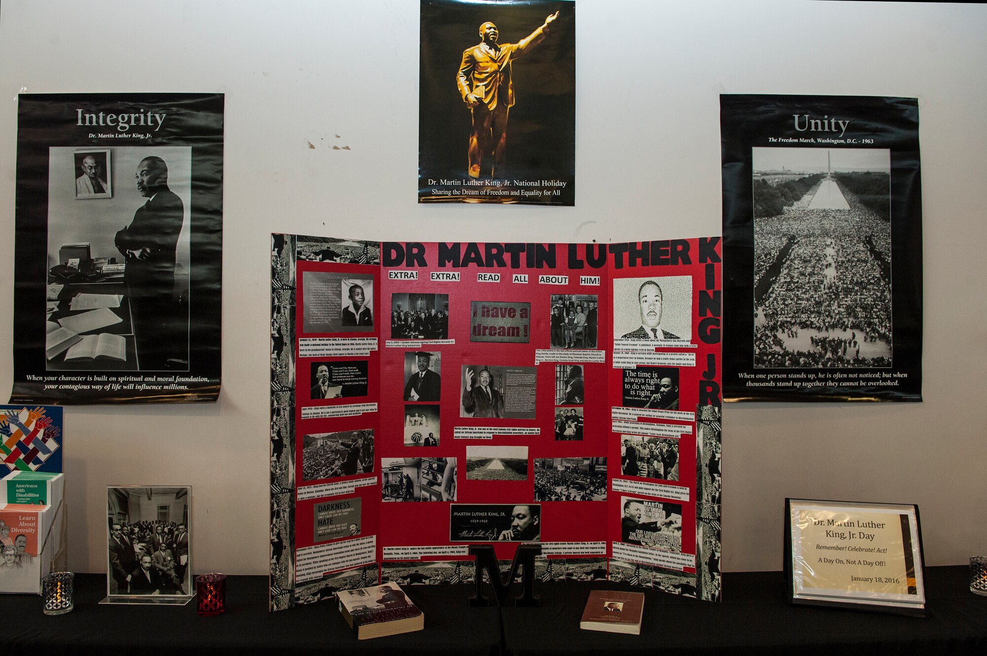 A display honoring Dr. Martin Luther King Jr. rests on a table during Diversity Day, Feb. 23, 2016, at Moody Air Force Base, Ga. The event was designed to honor the history of various cultures and groups such as African American, Native American, Hispanic, women and disability employment awareness. (U.S. Air Force photo by Airman 1st Class Lauren M. Johnson/Released) 