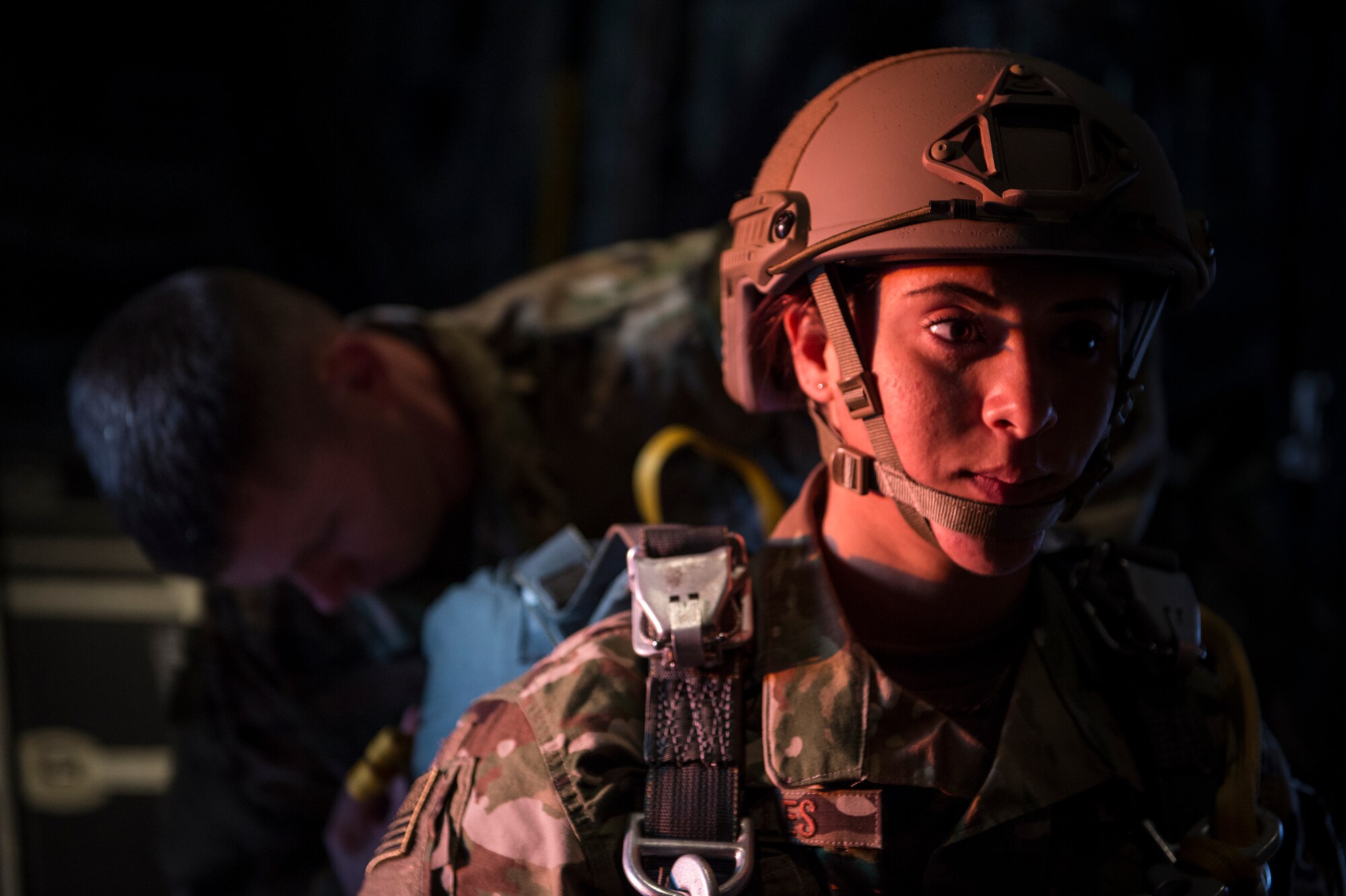 U.S. Air Force Airmen from the 820th Base Defense Group prepare for personnel drops in the back of an HC-130J Combat King II, Feb. 18, 2016, in the skies over South Ga. Multiple U.S. Air Force aircraft within Air Combat Command conducted joint aerial training at Grand Bay Bombing and Gunnery Range. During the training, the aircraft conducted tactical air and ground maneuvers, as well as weapons training. (U.S. Air Force photo by Senior Airman Ryan Callaghan/Released)

