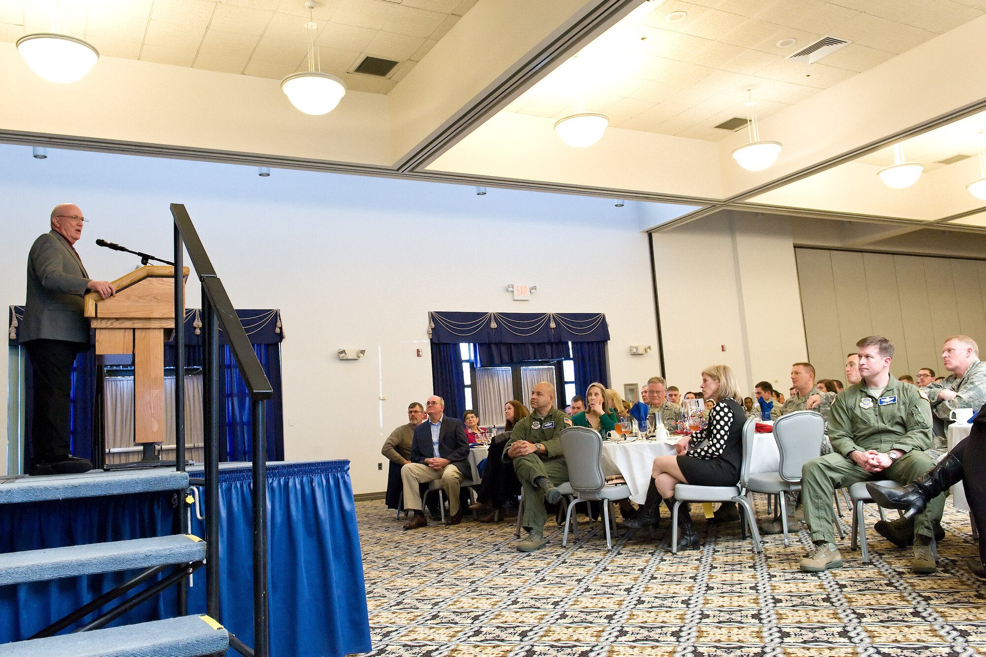 National Prayer Luncheon attendees listen to retired Chaplain (Maj. Gen.) Cecil Richardson, former Chief of Air Force Chaplains, Headquarters U.S. Air Force, Washington, D.C., Feb. 18, 2016, at the Landings on Dover Air Force Base, Del. Richardson shared his Crew Chief Prayer he wrote a couple of years ago and then told the story of Jonah and the Whale that is shared by many major religions throughout the world. (U.S. Air Force photo/Roland Balik)