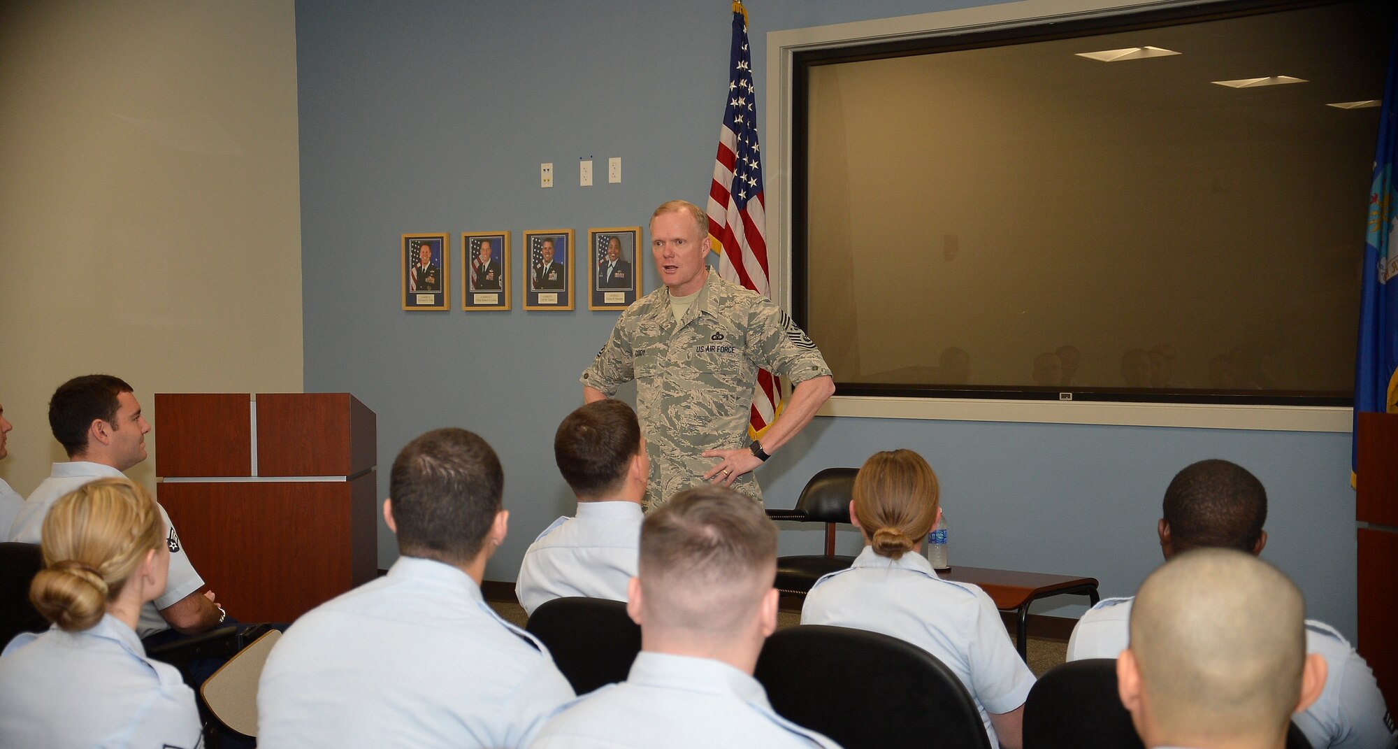 Chief Master Sgt. of the Air Force James A. Cody answers a question from an Airman attending the Chief Master Sgt. Aubert E. Dozier Airman Leadership School (ALS) at MacDill Air Force Base, Fla., Feb. 22, 2016. Cody met with the ALS class to discuss current topics and trends affecting new supervisors. (U.S. Air Force photo by Senior Airman Jenay Randolph)