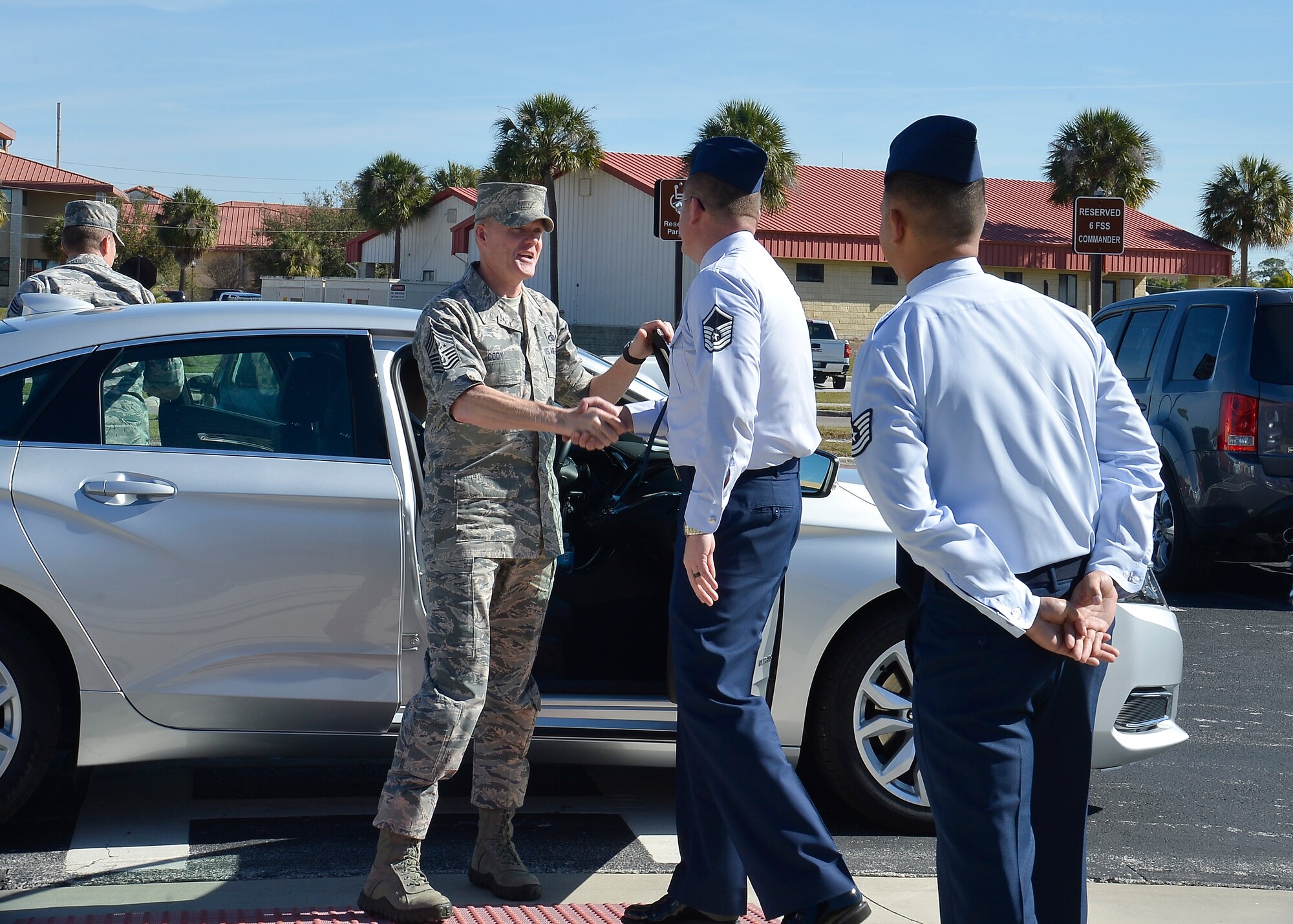 Chief Master Sgt. of the Air Force James A. Cody greets Master Sgt. Byron Hayes, a career assistance advisor with the 6th Force Support Squadron, during his visit to MacDill Air Force Base, Fla., Feb. 22, 2016. Cody had an open discussion with current Airman Leadership School students, where he answered questions and shared his insight on aspects of the Air Force. (U.S. Air Force photo by Senior Airman Jenay Randolph)