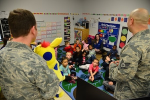Children listen as U.S. Airmen assigned to the 633rd Dental Squadron talk about dental hygiene at Langley Air Force Base, Va., Feb. 23, 2016. With February being Children’s Dental Health Month, the Airmen took this opportunity to teach children at the Langley Child Development Center about practicing good dental hygiene. (U.S. Air Force photo by Staff Sgt. Aubrey White)