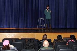 Kerry Solan, a U.S. Air Force veteran, performs during the Saturday Night Comedy show at Langley Air Force Base, Va., Feb. 20, 2016.  The comedy show is one of many events the Community Commons hosts for Joint Base Langley-Eustis for Service members and their families, as part of the Recharge for Resiliency program. (U.S. Air Force photo by Senior Airman Brittany E. N. Murphy)