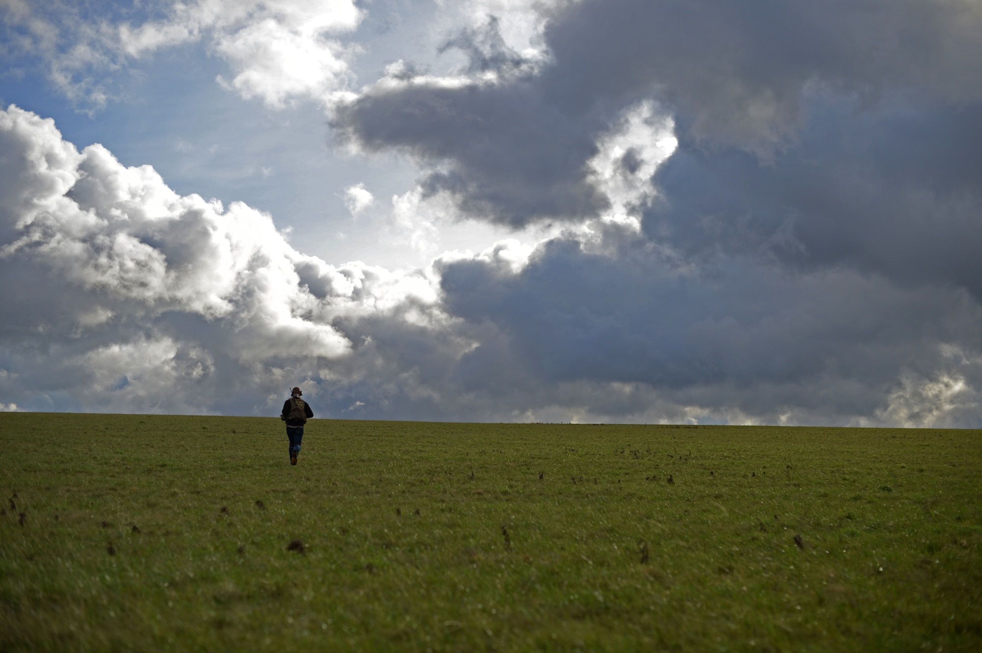 A 56th Rescue Squadron service member participates in a combat search and rescue task force training exercise near Hinderclay, England, Feb. 4, 2016. Andrew Aves, land owner, invites military bases around Europe, including U.S. personnel assigned to Ryal Air Foce bases, to use his land for training exercises year-round. (U.S. Air Force photo/Senior Airman Erin Trower) 
