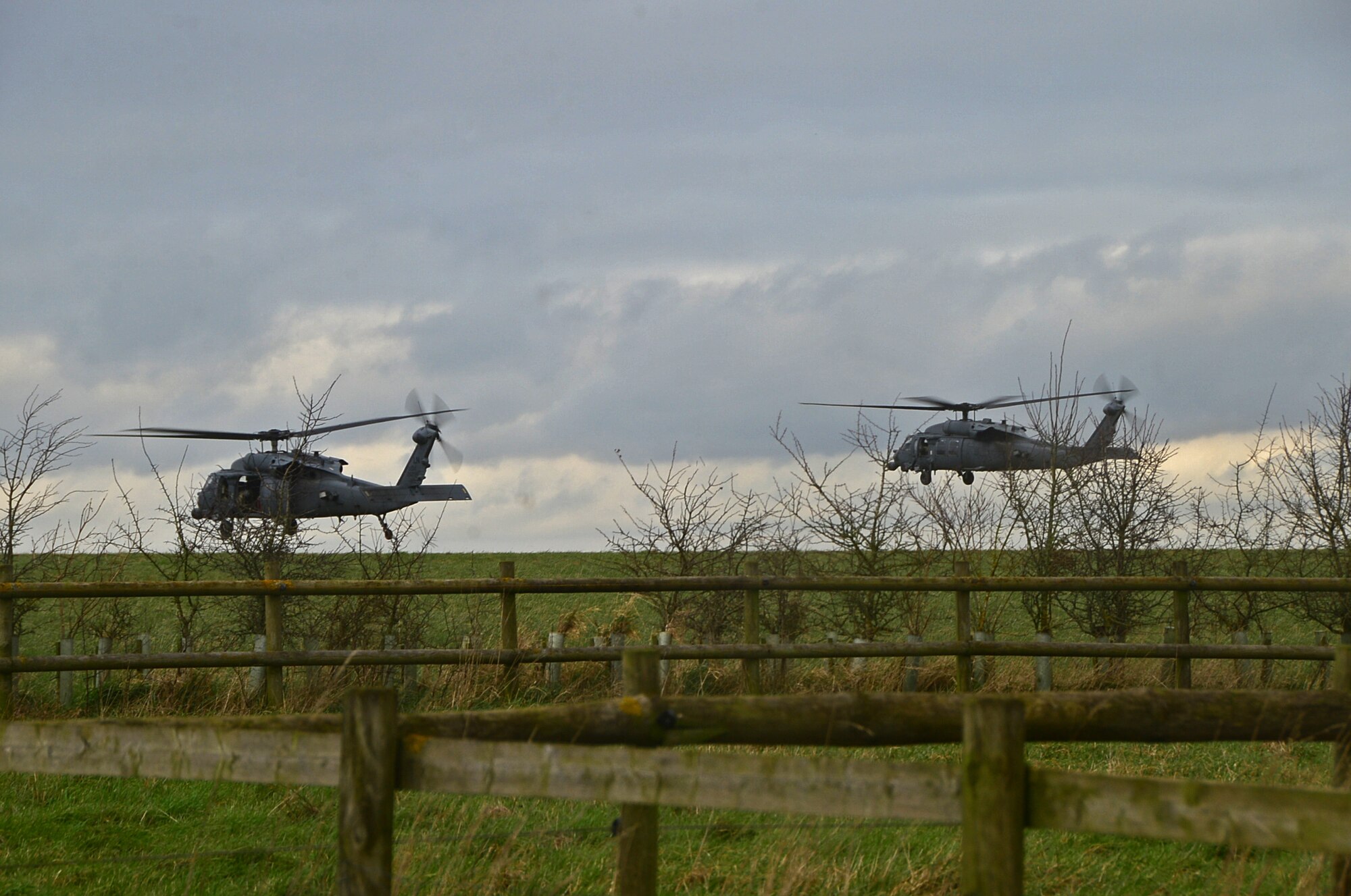 The 56th and 57th Rescue Squadrons participate in a combat search and rescue task force exercise using two HH-60G Pave Hawks near Hinderclay, England, Feb. 4, 2016. The Airmen performed various CSAR maneuvers in response to a simulated threat scenario. (U.S. Air Force photo/Senior Airman Erin Trower)