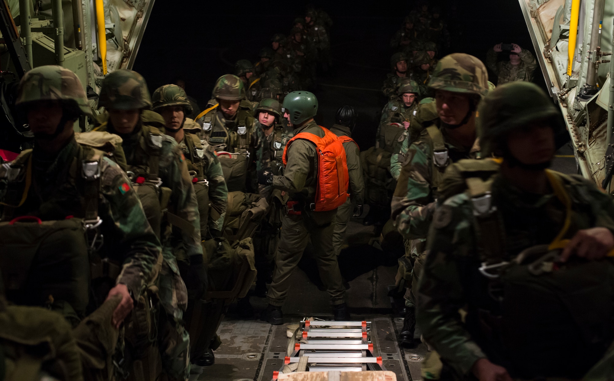 Approximately 70 Portuguese paratroopers board a C-130J Super Hercules assigned to the 37th Airlift Squadron as part of exercise Real Thaw 16 Feb. 22, 2016, in Beja, Portugal. Real Thaw 16 is a Portuguese hosted NATO exercise that provides tactical training to multiple participating nations. Its aim is to merge and employ different aerial platforms toward one major objective, covering a vast range of activities to include defensive and offensive counter-air operations, high value air assets protection and a slow mover protection. (U.S. Air Force/photo Senior Airman Jonathan Stefanko)