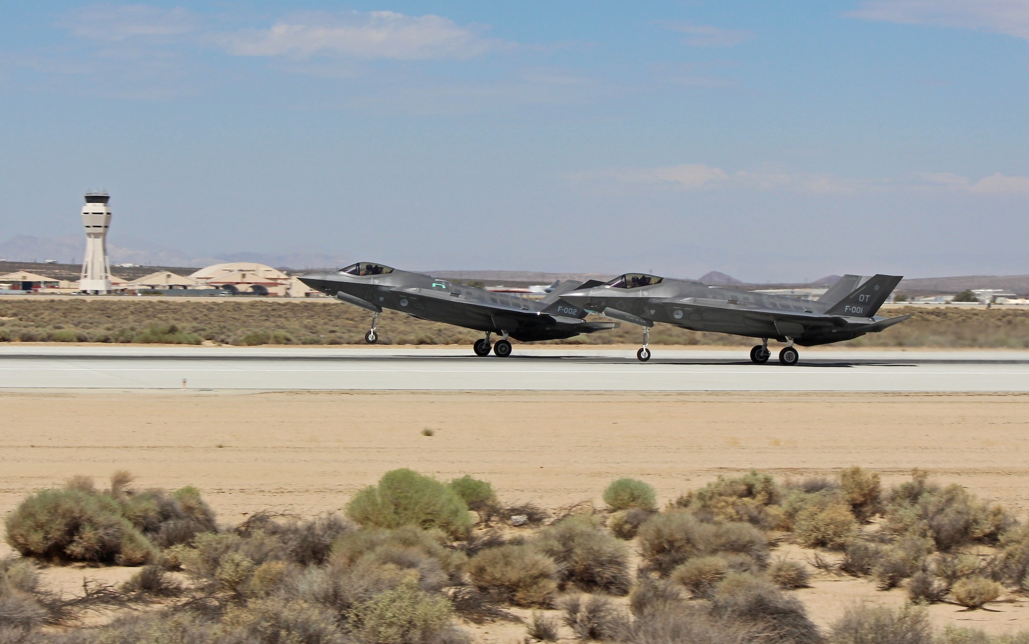 Two Royal Netherlands Air Force F-35A Lightning IIs take off from Edwards AFB. The Dutch stood up their first F-35 unit, Number 323 Squadron, in 2014, specifically to conduct operational testing and evaluation at Edwards. (Royal Netherlands Air Force photo)