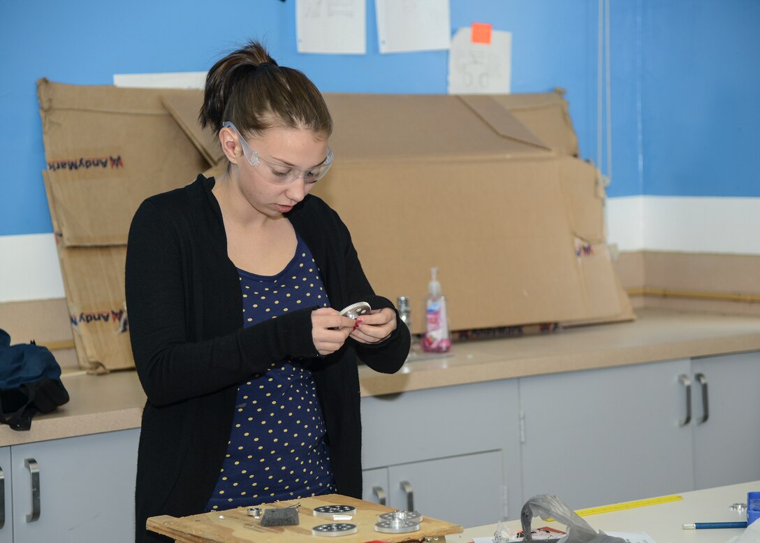 Caroline Deojay, grade 9, prepares for Saturday’s competition during practice Feb. 23. (U.S. Air Force photo by Rebecca Amber)