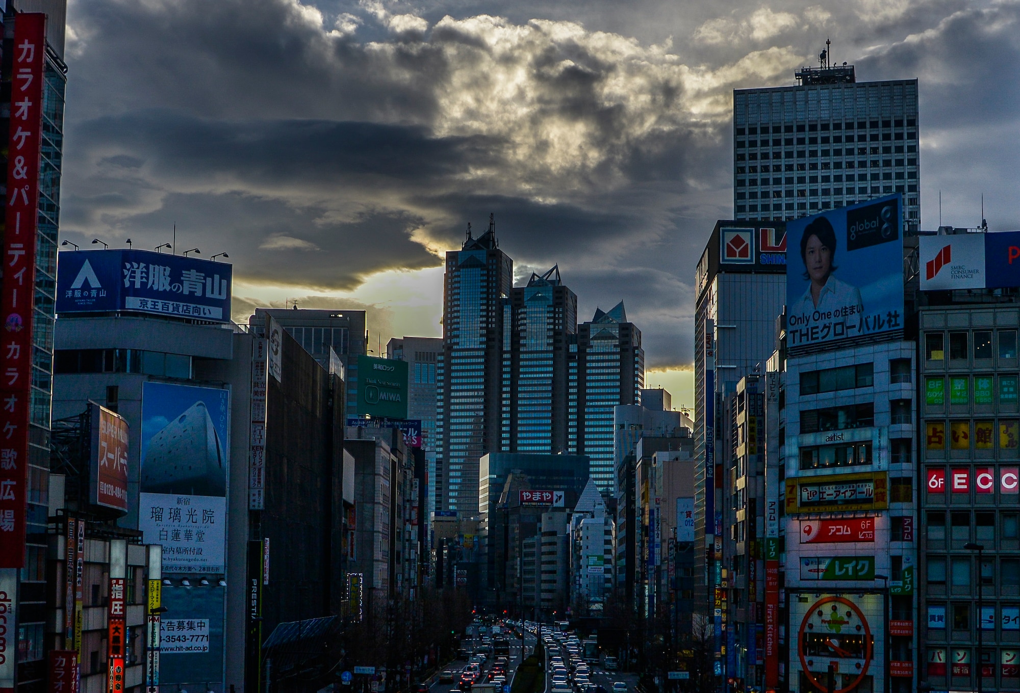 The sun sets behind buildings near the Shinjuku train station at Shinjuku, Japan, Feb. 17, 2016. The park is a short walk from Shinjuku Station and has three gates to enter the park: Shinjuku gate, Okido gate and Sendagaya gate. (U.S. Air Force photo by Senior Airman David Owsianka/Released)