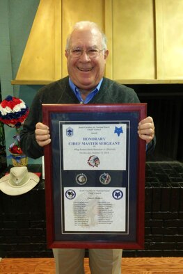 U.S. Air Force retired Master Sgt. Bob Barkalow from the South Carolina Air National Guard at McEntire Joint National Guard Base, is recognized as an honorary Chief Master Sgt., on Oct. 13, 2014 at an unknown location. Barkalow writes the monthly Retiree's Corner for the SCANG's eNewsletter. (U.S. Air National Guard courtesy photo)