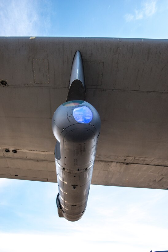 A Northrop Grumman LITENING pod targeting system is mounted on the wing of a 189th Airlift Wing C-130 H.  The Arkansas Air National Guard has been tapped by the Air National Guard Air Force Reserve Test Center (AATC) to provide a test bed for a new highly-accurate air drop and reconnaissance system. (Air National Guard photo by Master Sgt. Chris A. Durney.)