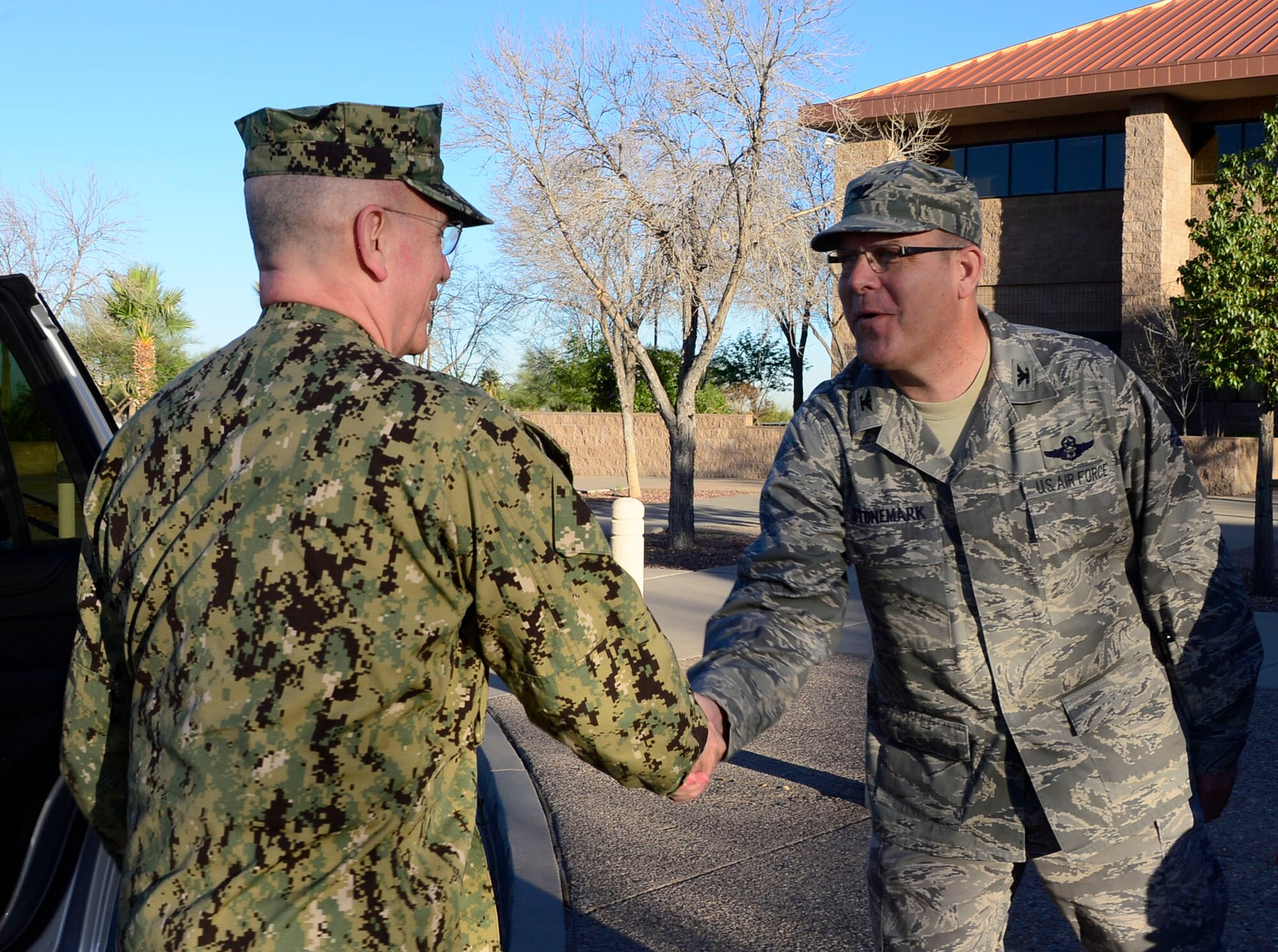 U.S. Navy Adm. Kurt Tidd, U.S. Southern Command commander, is greeted by U.S. Air Force Col. Robert Stonemark, 12th Air Force (Air Forces Southern) chief of staff, during the Tidd’s visit to 12th AF (AFSOUTH) at Davis-Monthan AFB, Ariz., Feb. 23, 2016.  Tidd assumed command of U.S. SOUTHCOM on Jan. 14, 2016 and is familiarizing himself with the various component services that make up a combatant command.  U.S. SOUTHCOM is responsible for all Department of Defense security cooperation in the 45 nations and territories of Central and South America and the Caribbean.  AFSOUTH is the air component to U.S. SOUTHCOM responsible for U.S. air and space operations throughout U.S. SOUTHCOM’s area of responsibility.  (U.S. Air Force photo by Tech. Sgt. Heather R. Redman/Released)