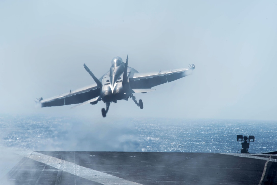 An E/A-18G Growler assigned to the Wizards of Electronic Attack Squadron 133 launches from the flight deck of the aircraft carrier USS John C. Stennis in the Philippine Sea, Feb. 23, 2016. U.S. Navy photo by Petty Officer 3rd Class Kenneth Rodriguez Santiago