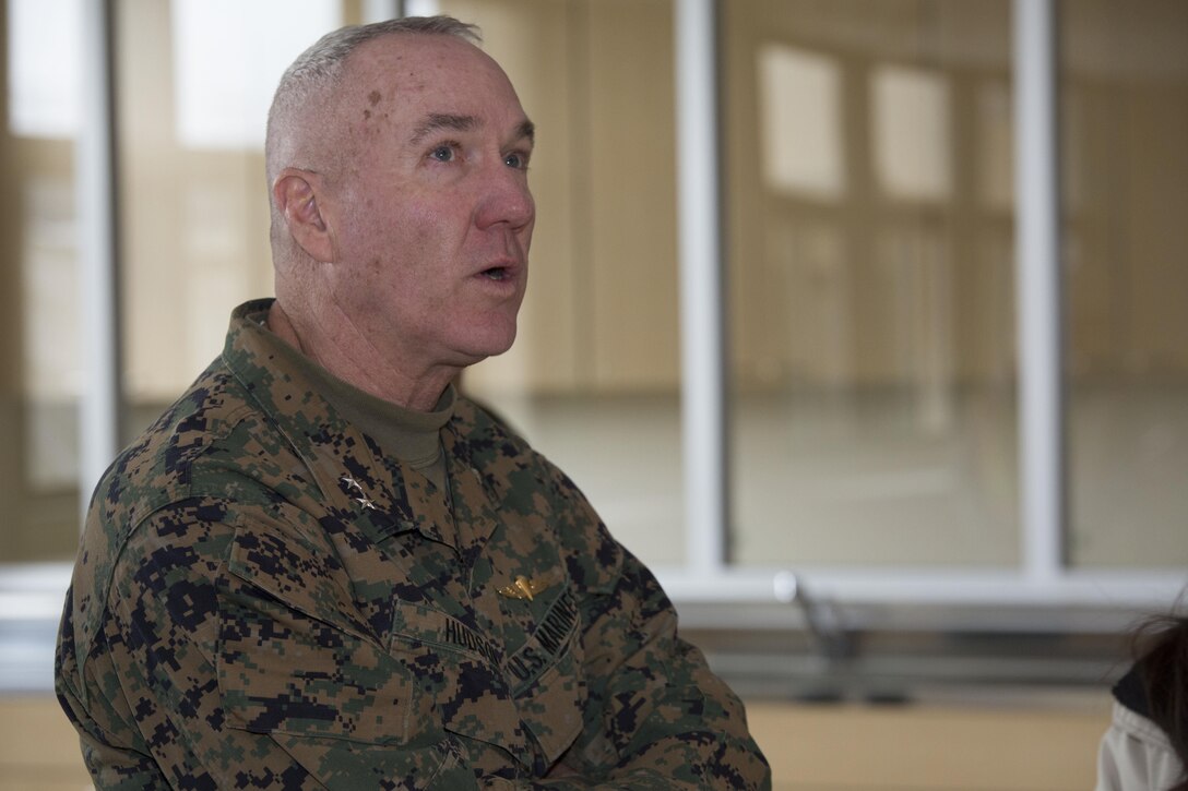 Maj. Gen. Charles Hudson, Marine Corps Installations Command commander, tours the new high school, currently under construction, at Marine Corps Air Station Iwakuni, Japan, Feb. 25, 2016. By touring MCAS Iwakuni, Hudson gained a deeper understanding of the impact MCAS Iwakuni has in the Asia-Pacific region, as well as the multitude of construction projects managed under the Defense Policy Review Initiative.