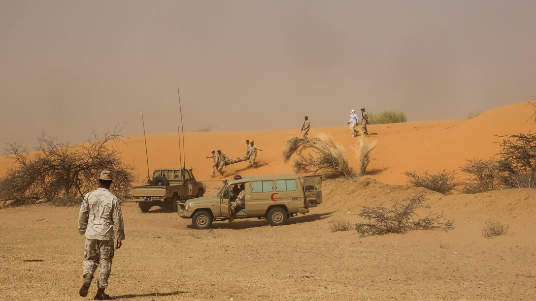 Marines and sailors evaluate Mauritanian soldiers treat and evacuate notional casualties during their final exercise in Tiguet, Islamic Republic of Mauritania, Feb. 17, 2016. Marines with Special-Purpose Marine Air-Ground Task Force Crisis Response-Africa spent five weeks with their Mauritanian counterparts training specialties including motor transportation and operations, supply, communications, medical and marksmanship.  The training between the two militaries builds the Mauritanians’ logistics capacity to provide sovereign security and counter terrorism while strengthening the bond between the two countries.
