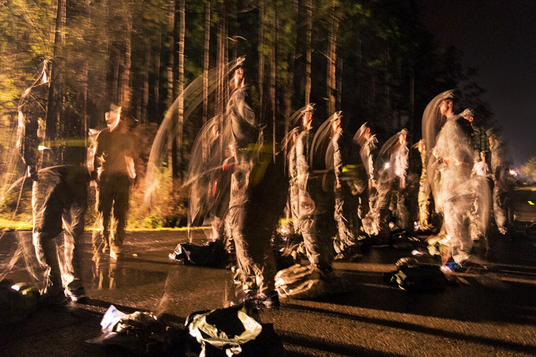 Soldiers and airmen participate in physical challenges during a portion of the Army Air Assault Course held at Camp Blanding Joint Training Center, Starke, Fla., Feb. 23, 2016. The soldiers and airmen must complete an obstacle course, ruck marches, multiple runs and slingload operations to graduate from Air Assault School. Florida Army National Guard photo by Ching Oettel