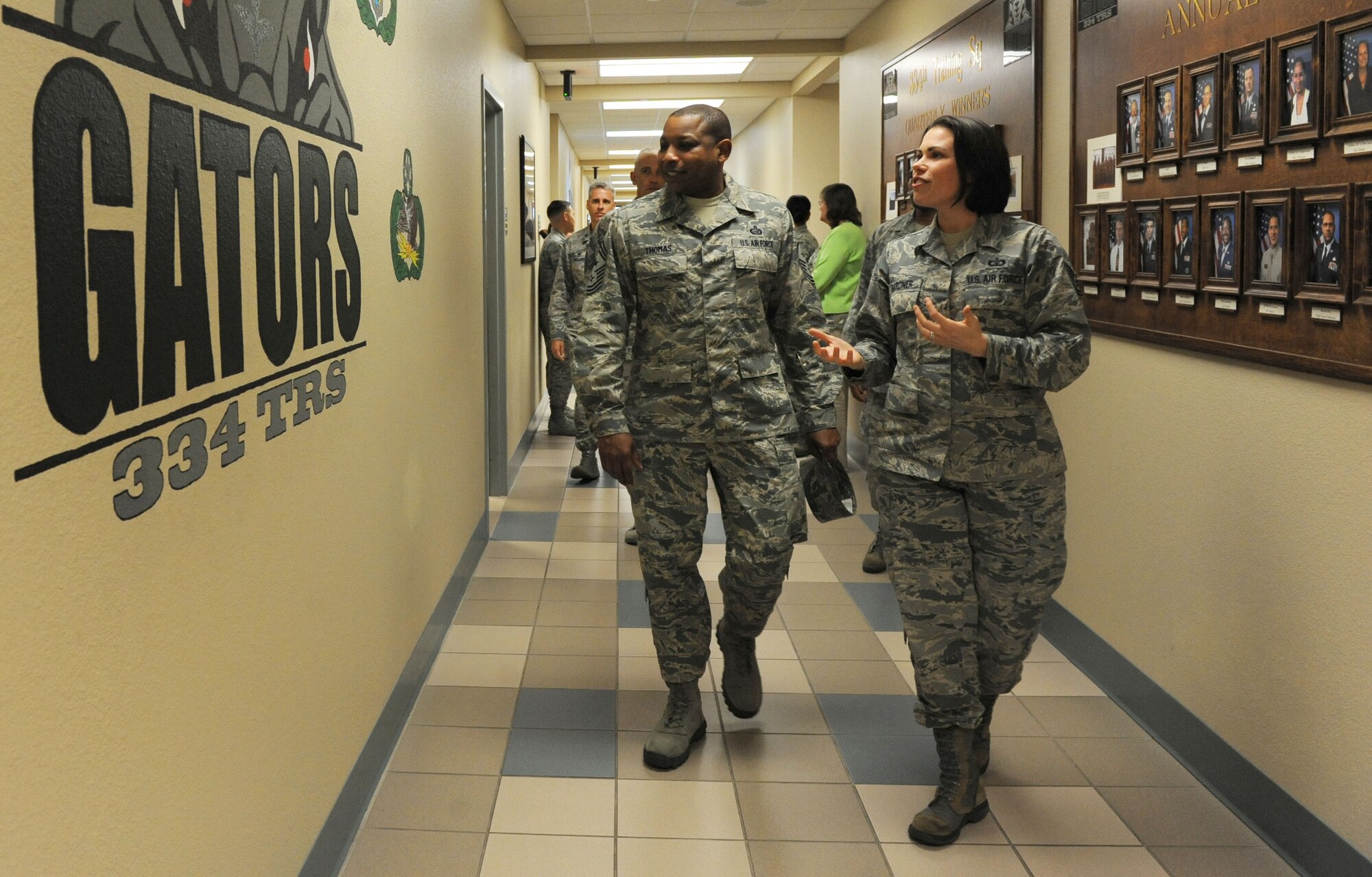 Tech. Sgt. Amy Gardner, 334th Training Squadron instructor, shows wall art to Chief Master Sgt. Farrell Thomas, 2nd Air Force command chief, at Cody Hall during an immersion tour Feb. 22, 2016, Keesler Air Force Base, Miss. Thomas visited the 81st Training Wing to become oriented with group missions, operations and personnel.  (U.S. Air Force photo by Kemberly Groue)