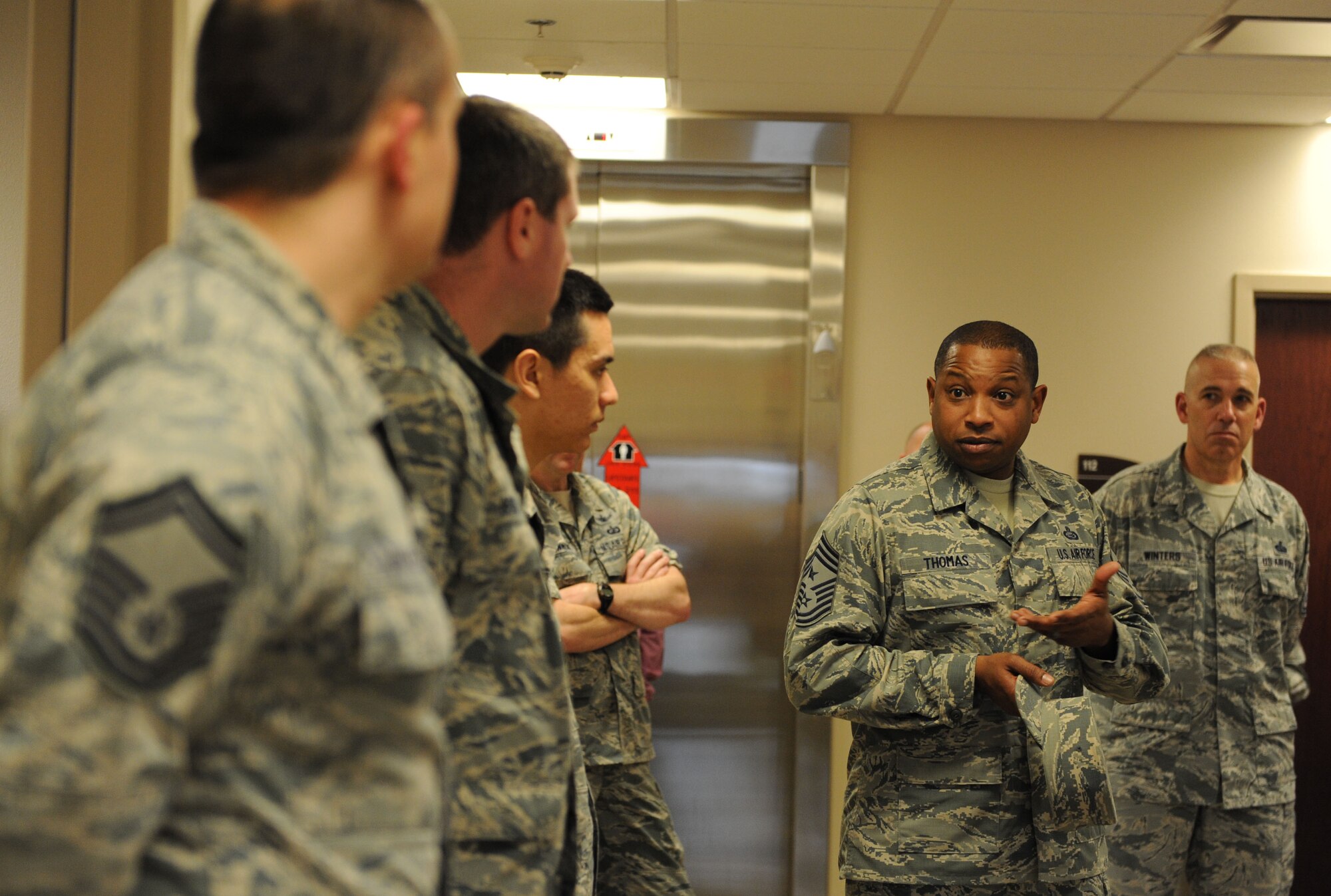Chief Master Sgt. Farrell Thomas, 2nd Air Force command chief, speaks to 81st Training Support Squadron Airmen at the Trainer Development Center during his immersion tour Feb. 22, 2016, Keesler Air Force Base, Miss. Thomas visited the 81st Training Wing to become oriented with group missions, operations and personnel.  (U.S. Air Force photo by Kemberly Groue)