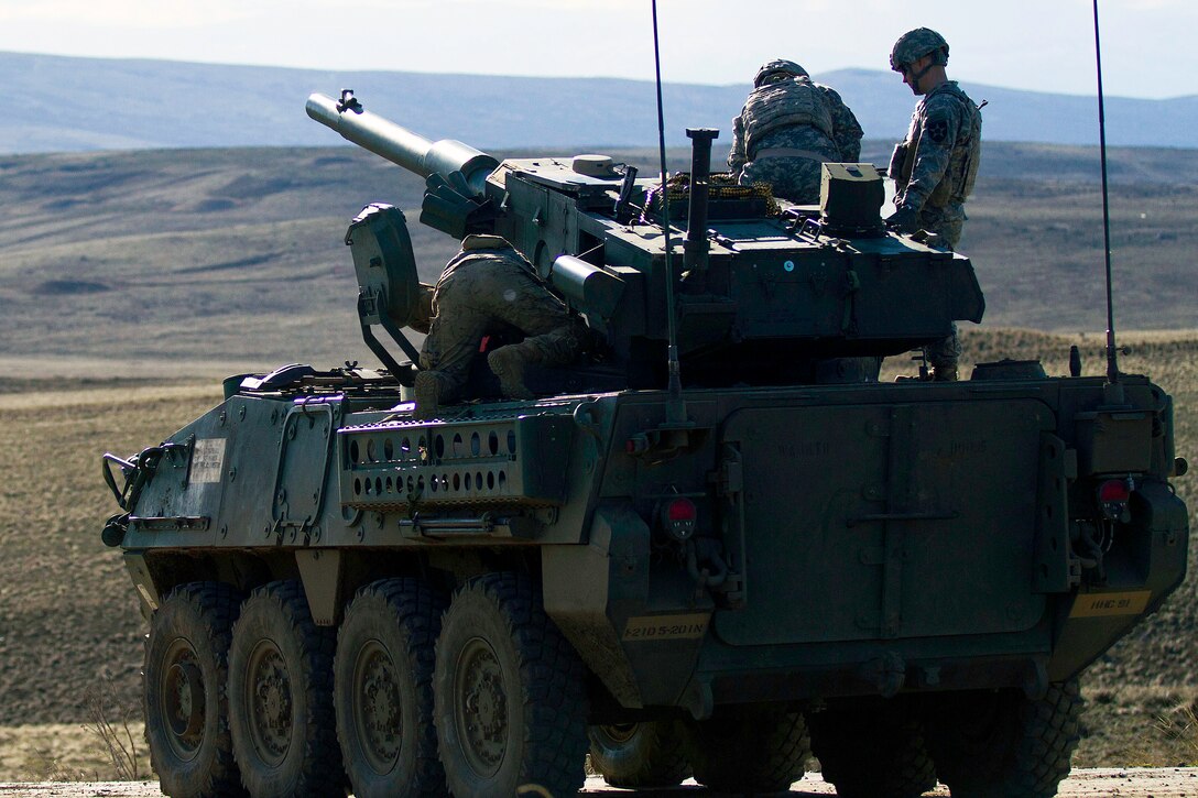 Soldiers prepare a Mobile Gun System Stryker variant for gunnery training at Yakima Training Center, Yakima, Wash., Feb. 23, 2016. U.S. Army photo by Sgt. Cody Quinn