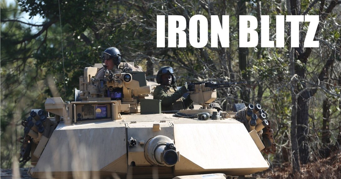 Marines with 2nd Tank Battalion along with 3rd Battalion, 6th Marine Regiment conducted a raid on Combat Town at Camp Lejeune, N.C., Feb. 21, 2016. 2nd Tanks provided direct fire support while the Marines from 3/6 assaulted the town after receiving word that the town held opposition forces within. The raid was part of a weeklong, large-scale operation known as Iron Blitz. Iron Blitz, a Marine Corps Combat Readiness Evaluation, tested 2nd Tanks in their ability to integrate all aspects of the Marine Air-Ground Task Force and function as a deployment-ready unit. (Marine Corps photo by Cpl. Shannon Kroening)