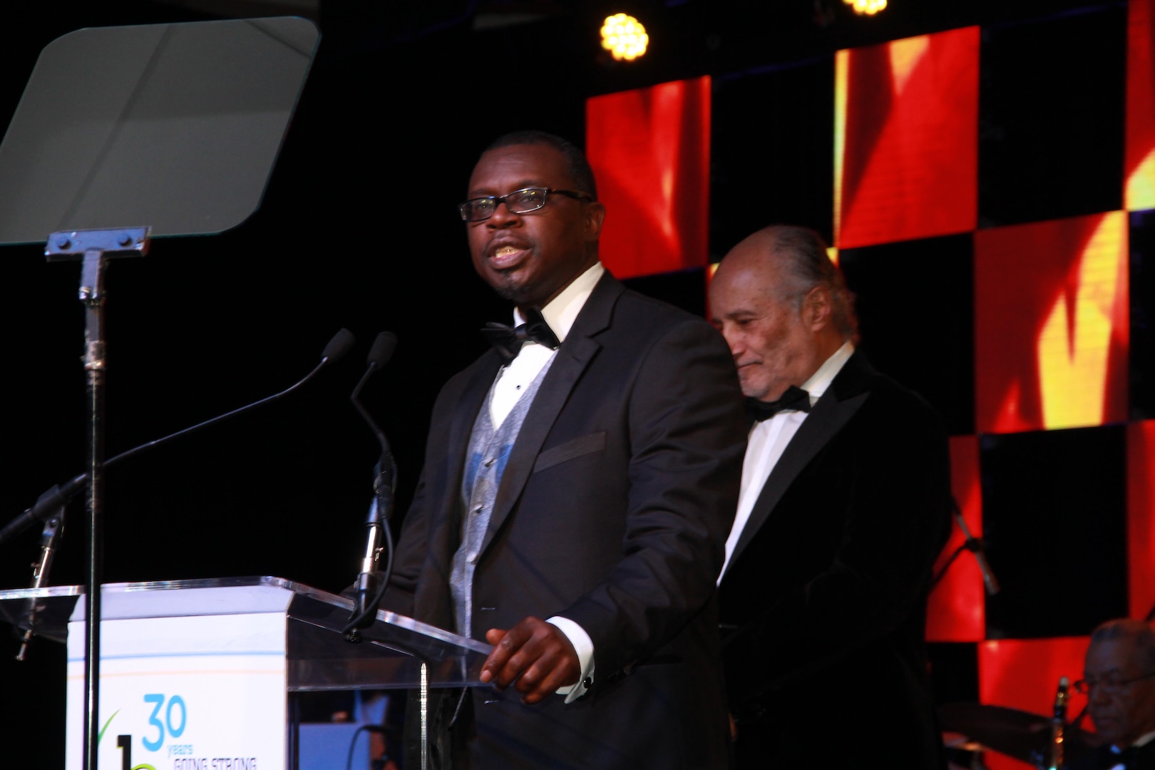 Ernest Yelder, Cybersecurity Technical Lead  at Combat Direction Systems Activity, Dam Neck accepts his 2016 Black Engineer of the Year Award from Dr. Ken Washington, Vice President of Research and Advanced Engineering, Ford Motor Company during the 30th Annual Black Engineer of the Year Awards (BEYA) in Philadelphia February 20.  Yelder is only one of three Navy engineers honored and the only one from Hampton Roads.