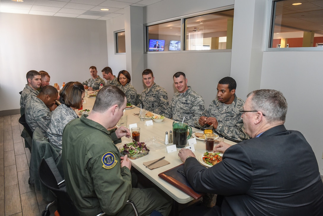 Deputy Defense Secretary Bob Work sits down to lunch with airmen at the Chadwell dining facility on F. E. Warren Air Force Base in Wyoming, Feb. 24, 2016. DoD photo by Army Sgt. 1st Class Clydell Kinchen