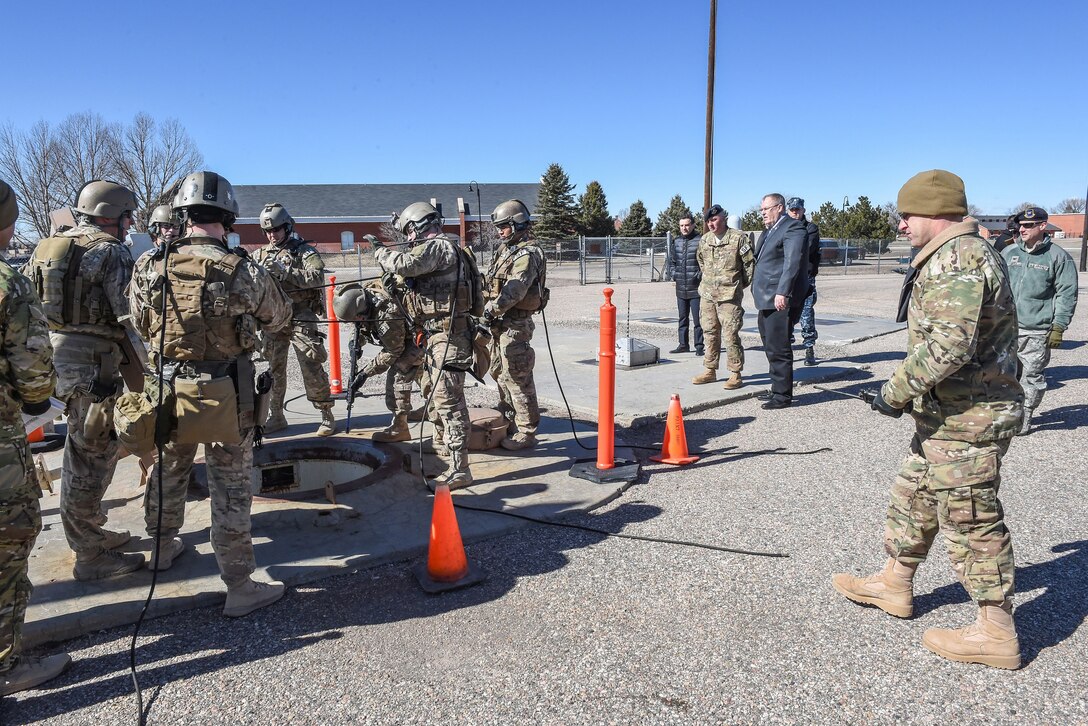Deputy Defense Secretary Bob Work watches a tactical response force demonstration on F. E. Warren Air Force Base in Wyoming, Feb. 24, 2016. DoD photo by Army Sgt. 1st Class Clydell Kinchen