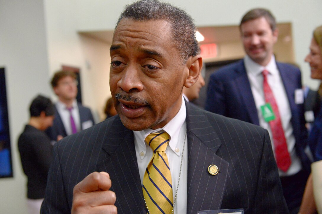 Dr. Jonathan Woodson, assistant secretary of defense for health affairs, speaks after attending a panel discussion at the White House Precision Medicine Initiative Summit in Washington, D.C., Feb. 25, 2016. DoD News photo by EJ Hersom