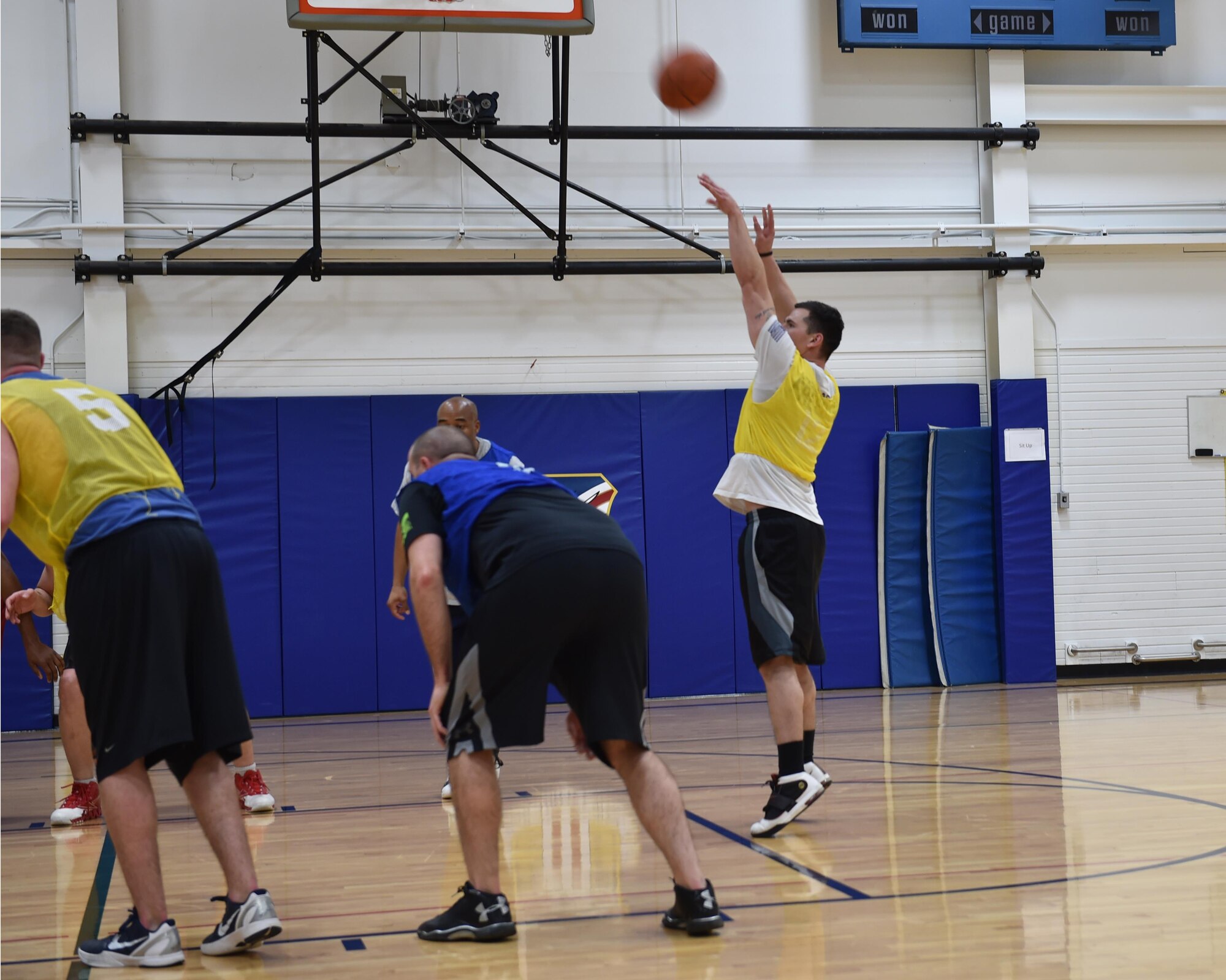 Senior Airman Joshua Thayer, a member of the 910th Security Forces Squadron (SFS), shoots a foul shot during an intramural basketball game between the SFS and the Navy and Marine Corps Reserve detachments here, Feb. 6, 2016. The game was part of the intramural basketball tournament hosted by the 910th Force Support Squadron. The tournament was open to all units based at Youngstown Air Reserve Station and is played annually during the winter months on Unit Training Assembly weekends. (U.S. Air Force Photo/ Tech. Sgt. Rick Lisum)