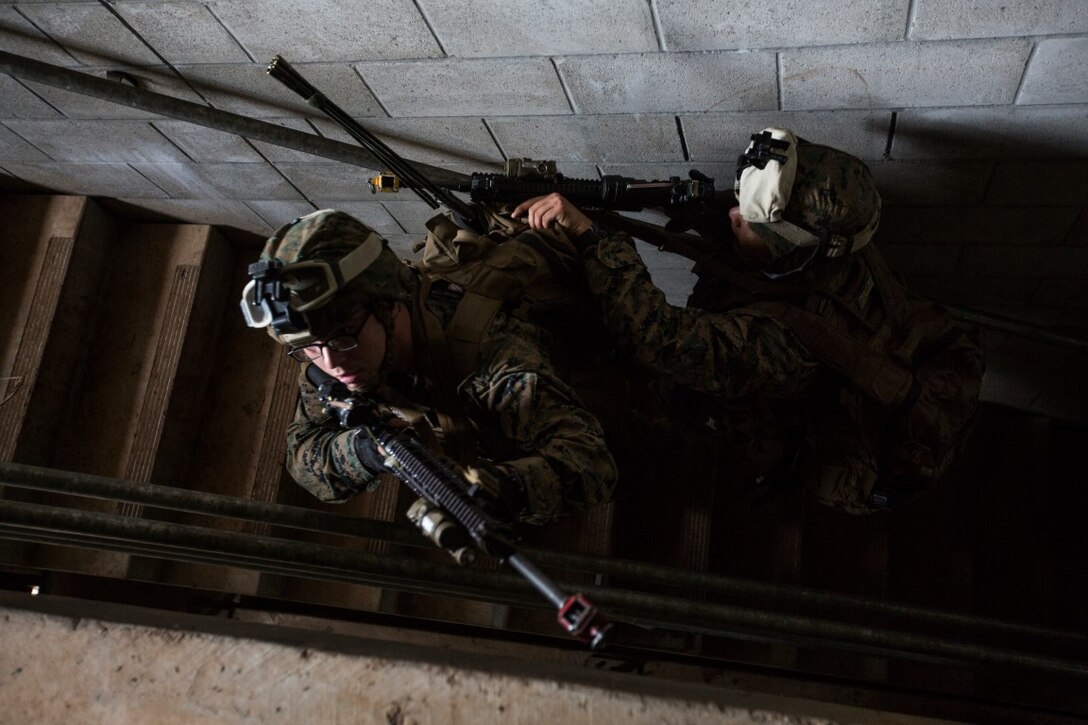 U.S. Marines with the 13th Marine Expeditionary Unit conduct Military Operations Urban Terrain training  at the Combined Arms Combat Training Facility, Oahu, Hawaii, Feb. 20, 2016.  The Boxer Amphibious Ready Group and the 13th Marine Expeditionary Unit conduct training at CACTF in preparation for operations in the Pacific and Central Commands' area of responsibilities during their western Pacific deployment 16-1. (U.S. Marine Corps photo by Sgt. Tyler C. Gregory/released)