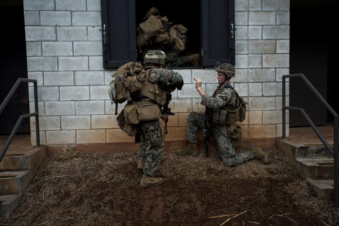 U.S. Marines with the 13th Marine Expeditionary Unit conduct Military Operations in Urban Terrain training  at the Combined Arms Combat Training Facility, Oahu, Hawaii, Feb. 20, 2016.  The Boxer Amphibious Ready Group and the 13th Marine Expeditionary Unit conduct training at CACTF in preparation for operations in the Pacific and Central Commands' area of responsibilities during their western Pacific deployment 16-1. (U.S. Marine Corps photo by Sgt. Tyler C. Gregory/released)