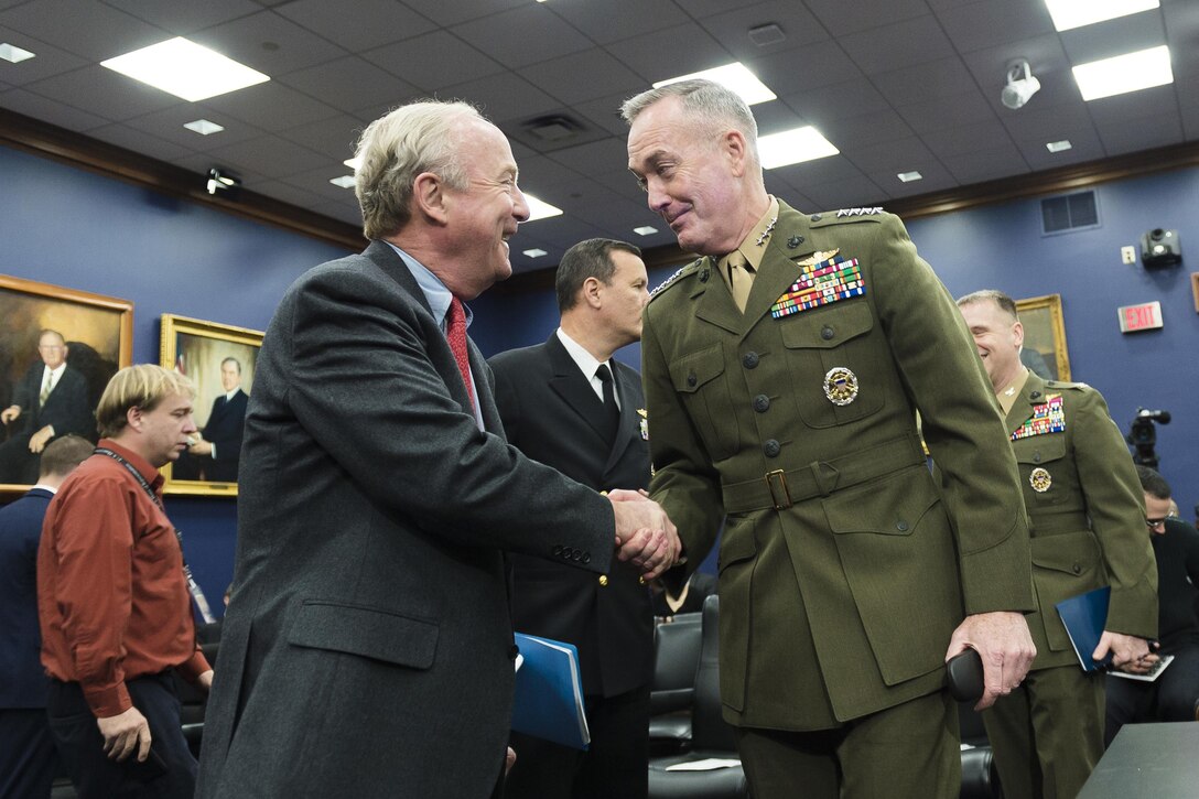 Marine Corps Gen. Joseph F. Dunford Jr., right, chairman of the Joint Chiefs of Staff, shakes hands with U.S. Rep. Rodney Frelinghuysen of New Jersey before he testified on the fiscal year 2017 defense budget proposal before the House Appropriations Committee in Washington, D.C., Feb. 25, 2016. Defense Secretary Ash Carter also testified. DoD photo by Army Staff Sgt. Sean K. Harp