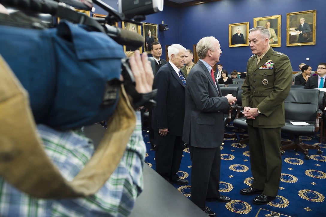 Marine Corps Gen. Joseph F. Dunford Jr., chairman of the Joint Chiefs of Staff, speaks with U.S. Rep. Rodney Frelinghuysen of New Jersey before testifying before the House Appropriations Committee in Washington, D.C., Feb. 25, 2016. DoD photo by Army Staff Sgt. Sean K. Harp