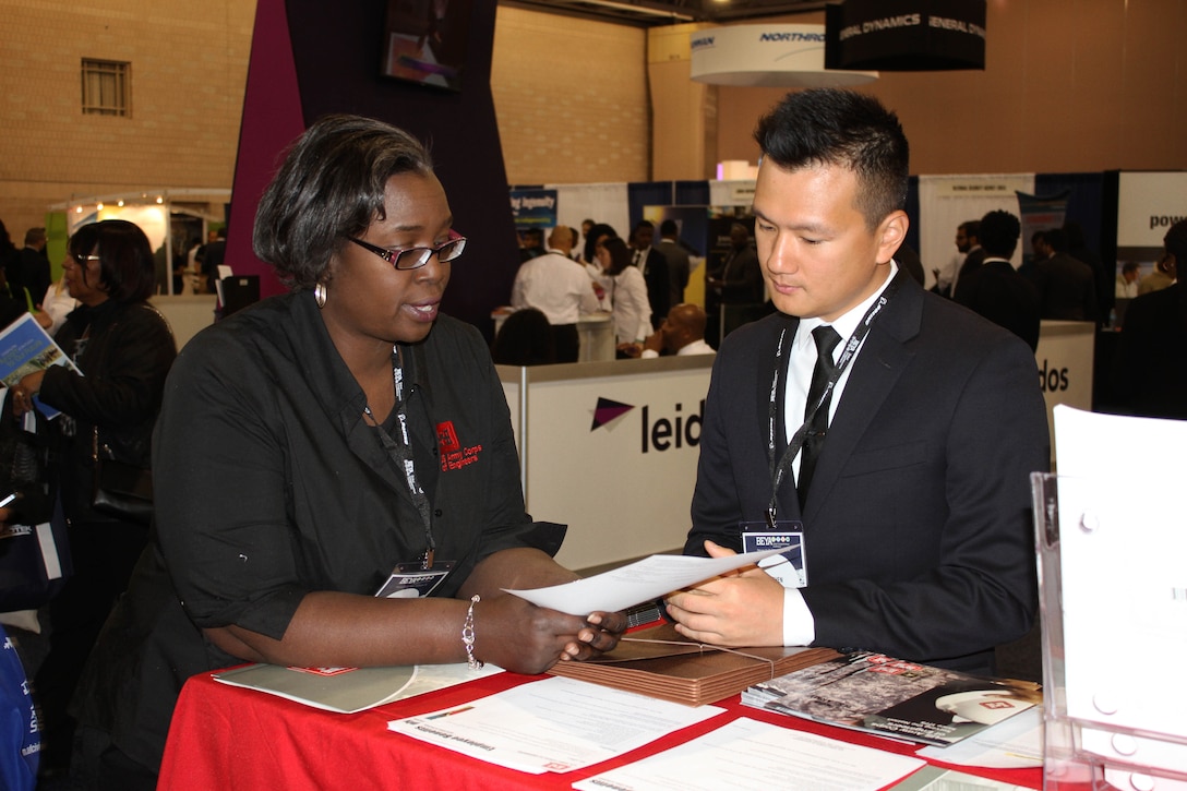 USACE Philadelphia District Engineer Christine Lewis-Coker spoke with a student during the Black Engineer of the Year Award Conference (BEYA) in Philadelphia Feb 18-20, 2016. USACE employees met with students and young professionals at the event career fair. 