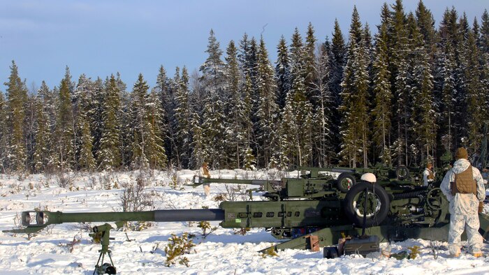 Marines with Combined Arms Company prepare their M777 Howitzers for a live-fire shoot in Rena, Norway, Feb. 23, 2016, in preparation for Exercise Cold Response 16. The exercise will include 12 NATO allies and partner nations, and approximately 16,000 troops. The Marines will provide indirect fire support for infantry units during the exercise.