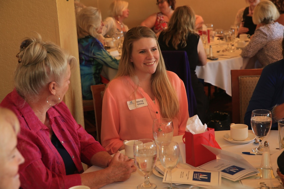 Katie Goss, wife of Sgt. John Goss III, electronic warfare operator, Tactical Training Exercise Control Group, talks with the Ladies of the Assistance League of Palm Springs Desert Area during the assistant leagues’ Baby Shower Luncheon for Combat Center expectant mothers at the Oasis Country Club in Palm Desert, Calif., Feb. 16, 2016. (Official Marine Corps Photo by Cpl. Julio McGraw/Released)
