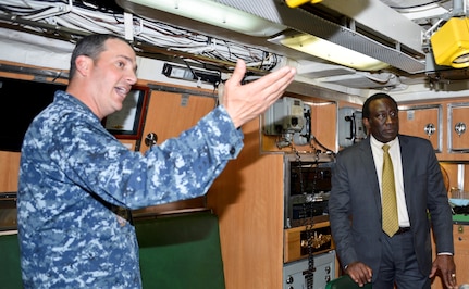 160219-N-EF781-010 
JOINT BASE PEARL HARBOR-HICKAM, Hawaii (Feb. 16, 2016)  Ray Shepherd (right), Director of Defense Media Activity for the Department of Defense, recently toured the Los Angeles-class fast-attack submarine, USS Greeneville (SSN 772) at Pearl Harbor. Cmdr. Gabriel Anseeuw (left), commanding officer of USS Greeneville, led Shepherd and a group of DMA officials on a tour highlighting the capabilities of America’s nuclear-powered submarine force. Shepherd’s role is to provide a direct line of communication for news and information to U.S. forces worldwide.  (U.S. Navy photo by Lieutenant Brett Zimmerman/Released)