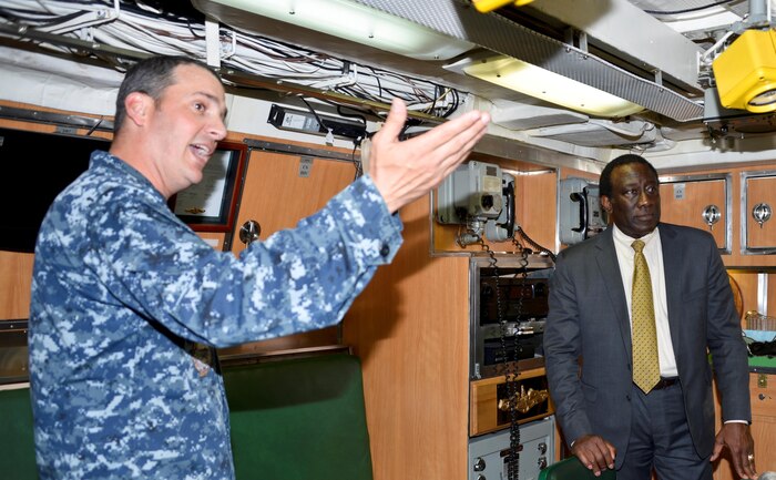 160219-N-EF781-010 
JOINT BASE PEARL HARBOR-HICKAM, Hawaii (Feb. 16, 2016)  Ray Shepherd (right), Director of Defense Media Activity for the Department of Defense, recently toured the Los Angeles-class fast-attack submarine, USS Greeneville (SSN 772) at Pearl Harbor. Cmdr. Gabriel Anseeuw (left), commanding officer of USS Greeneville, led Shepherd and a group of DMA officials on a tour highlighting the capabilities of America’s nuclear-powered submarine force. Shepherd’s role is to provide a direct line of communication for news and information to U.S. forces worldwide.  (U.S. Navy photo by Lieutenant Brett Zimmerman/Released)