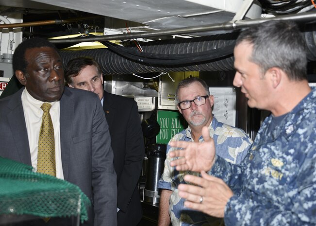 JOINT BASE PEARL HARBOR-HICKAM, Hawaii (Feb. 16, 2016) Ray Shepherd (left), director of Defense Media Activity for the Department of Defense, recently toured the Los Angeles-class fast-attack submarine, USS Greeneville (SSN 772) at Pearl Harbor. Cmdr. Gabriel Anseeuw (right), commanding officer of USS Greeneville, led Shepherd and a group of DMA officials on a tour highlighting the capabilities of America’s nuclear-powered submarine force. Shepherd’s role is to provide a direct line of communication for news and information to U.S. forces worldwide. (U.S. Navy photo by Lt. Brett Zimmerman/Released)