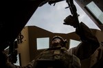 U.S. Marine Lance Cpl. Andrew Metler, a mortarman with Bravo Company, 1st Battalion, 7th Marine Regiment, Special Purpose Marine Air Ground Task Force-Crisis Response-Central Command (SPMAGTF-CR-CC), mans the turret gun of a Humvee during a patrol in Al Taqaddum, Iraq, Jan. 1, 2016. U.S. Marines with SPMAGTF-CR-CC are responsible for the force protection of some Combined Joint Task Force – Operation Inherent Resolve bases within the U.S. Central Command area of responsibility. (U.S. Marine Corps Photo by Sgt. Rick Hurtado / Released)