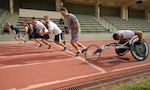 Wounded Warrior participants start the 800-meter dash during the track and field trials as part of the first ever Wounded Warrior Pacific Trials at the Iolani School Kozuk Stadium in Honolulu, Nov. 15, 2012. Nearly 50 seriously wounded ill and injured sailors and Coast Guardsmen from across the country are competing for a place on the 2013 Warrior Games Navy-Coast Guard team. 