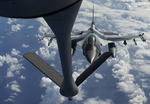 An 18th Aggressor Squadron F-16C Fighting Falcon prepares to connect to a 909th Air Refueling Squadron KC-135 Stratotanker for aerial refueling during the large force employment of exercise Cope North 16, Feb. 24, 2016, at Andersen Air Force Base, Guam. Through training exercises such as CN16, the U.S., Japan and Australian air forces develop combat capabilities, enhancing air superiority, electronic warfare, air interdiction, tactical airlift and aerial refueling. (U.S. Air Force photo by Staff Sgt. Matthew B. Fredericks/Released)