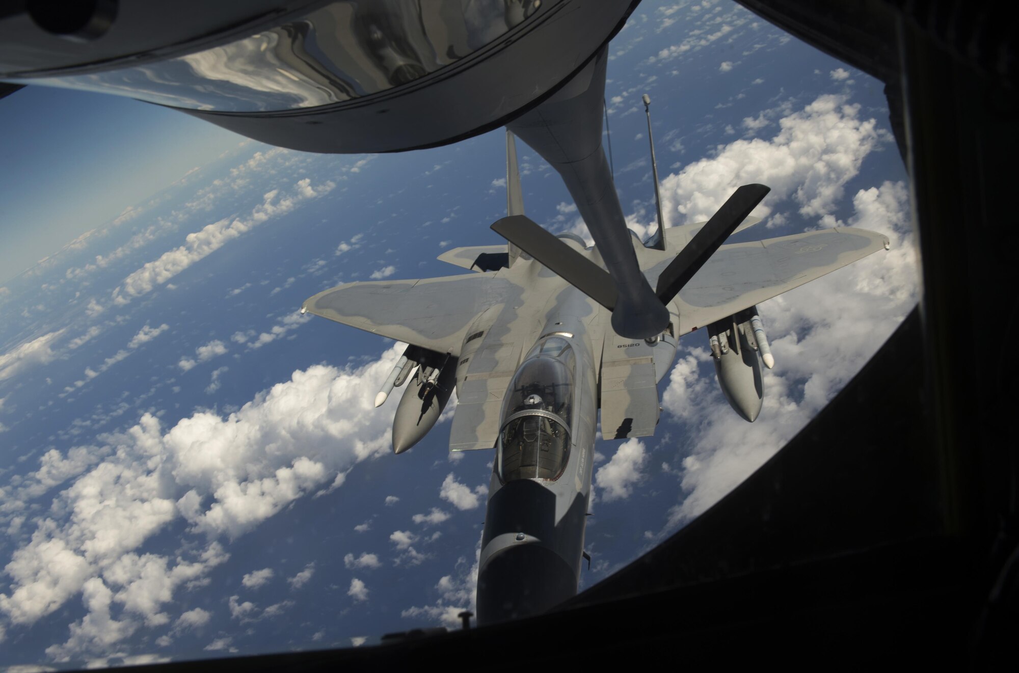 A 44th Fighter Squadron F-15 Eagle connects to a 909th Air Refueling Squadron KC-135 Stratotanker for aerial refueling during the large force employment of exercise Cope North 16, Feb. 24, 2016, at Andersen Air Force Base, Guam. Through training exercises such as CN16, the U.S., Japan and Australian air forces develop combat capabilities, enhancing air superiority, electronic warfare, air interdiction, tactical airlift and aerial refueling. (U.S. Air Force photo by Staff Sgt. Matthew B. Fredericks/Released)