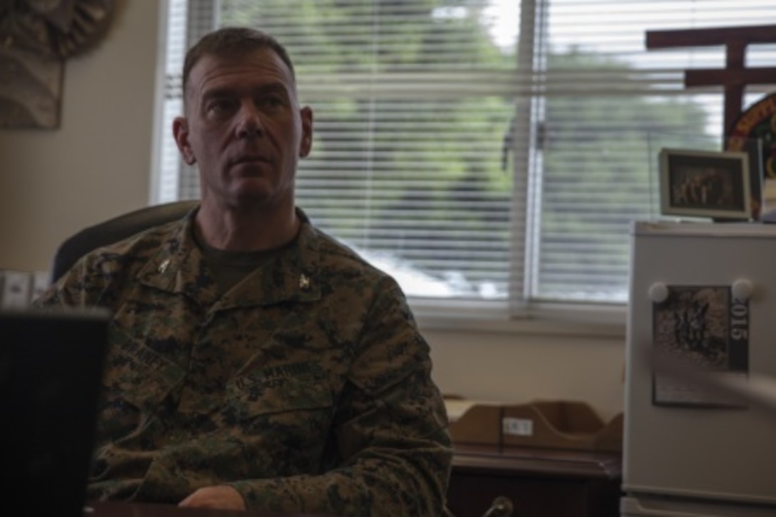 Pictured is Col. Chris Braney preparing for a visit with Japan Ground Self Defense Force logistics officers on Camp Kinser, Feb. 22. The visit is an effort to share the Marine Corps' standard operating procedures in supply and distribution operations with the JGSDF in hopes of enhancing future combined or coalition operations. Braney, from Syracuse, New York, is the regimental commanding officer of Combat Logistics Regiment 35, 3rd Marine Logistics Group, III Marine Expeditionary Force. 