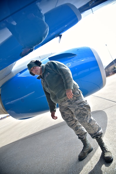 Senior Airman Colby Cannizzaro, 932nd Airlift Wing crew chief with the C-40C performs a post flight inspection Feb. 18, 2016 at Scott Air Force Base, Illinois.  Cannizzaro said he looks for any possible bird strike or rock damage that might have occurred during the flight. The 932nd Airlift Wing, an Air Force Reserve flying unit, is the only Reserve wing to fly the C-40C, operational support and team travel distinguished visitor aircraft. (U.S. Air Force photo by Christopher Parr)