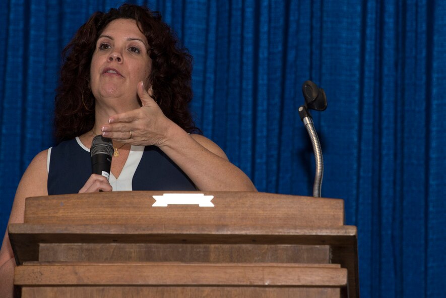 Rhonda Sterner, senior military health account manager for a local health agency, speaks during a MiCare town hall briefing, Feb. 24, 2016, at Moody Air Force Base, Ga. MiCare patients can utilize the online service to connect with their health providers, add dependents to their accounts, and access health records 24/7. (U.S. Air Force photo by Airman 1st Class Greg Nash/Released) 