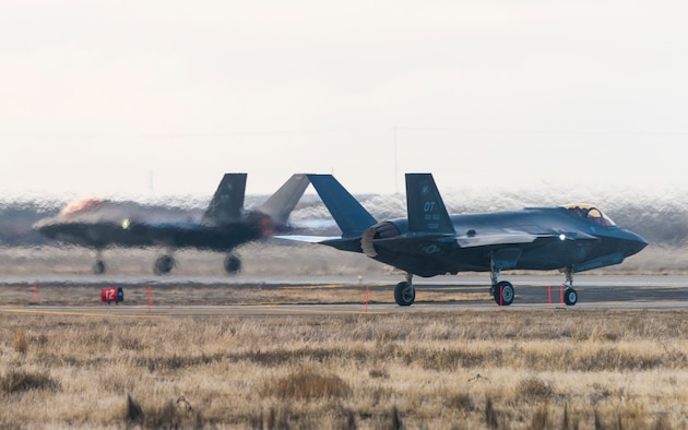 Two F-35As stationed at Edwards Air Force Base, Calif. cross paths at Mountain Home AFB, Idaho, Feb. 11, 2016. The aircrafts team, assigned to the 31st Test Evaluation Squadron, conducted combat simulation tests to determine its efficiency downrange.
(U.S. Air Force photo by Airman 1st Class Connor J. Marth/RELEASED)