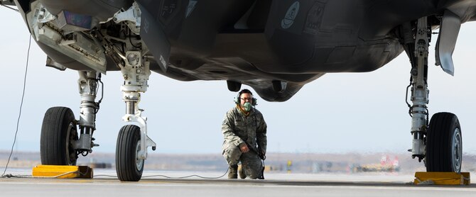 Staff Sgt. Wesley Krueger, 31st Aircraft Maintenance Squadron avionics specialist, inspects an F-35A before takeoff Feb. 16, 2016 at Mountain Home Air Force Base, Idaho. Krueger and his team from Edwards AFB, Calif. visited Mountain Home AFB to determine the aircraft’s effectiveness in a deployed environment. (U.S. Air Force photo by Airman 1st Class Connor J. Marth/RELEASED)