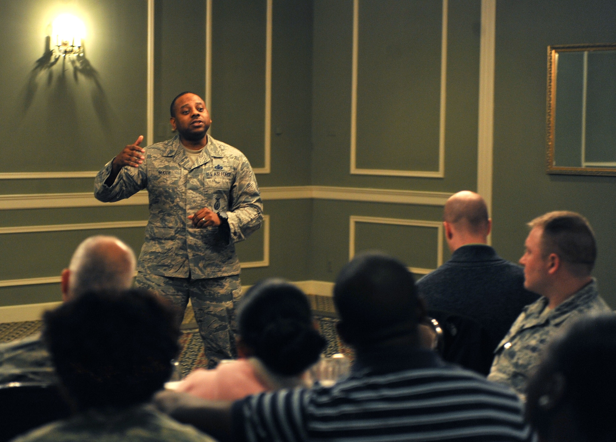 Master Sgt. Demetrius Booth, with the 55th Security Forces Squadron at Offutt Air Force Base, Neb., speaks to members of Team Offutt attending the Black History Month lunch and learn at the Patriot Club Feb. 17, 2016. The event was hosted by the Offutt Diversity Team. (U.S. Air Force photo/Senior Airman Rachel Hammes)